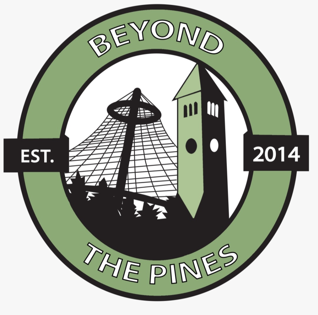 A green circular logo with 