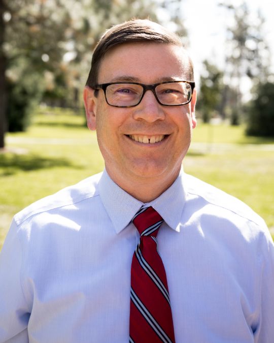 Headshot of John Larkin