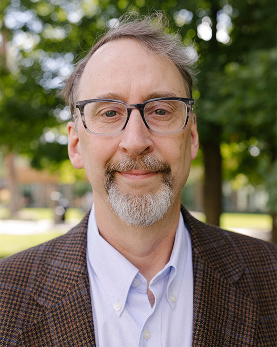 Headshot of Kraig Wheeler
