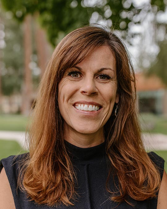 Headshot of Stacy George