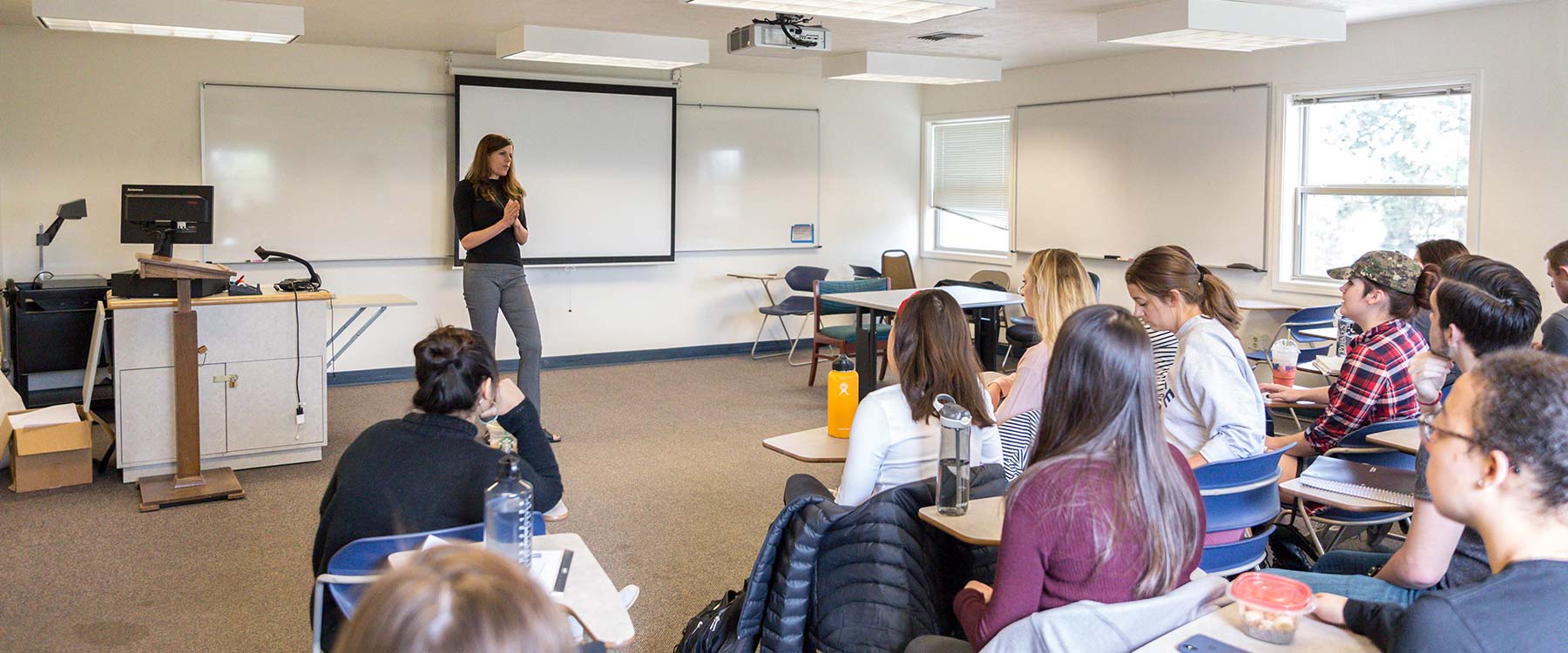 Sociology professor Stacy George talks teaches a class
