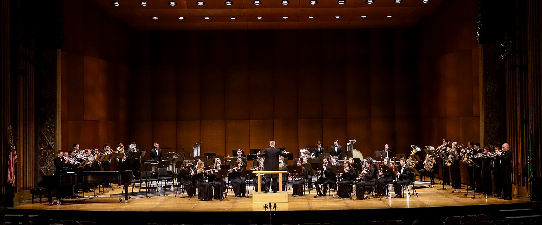 A full symphony of students performing on the stage of the Martin Woldson Theater at the Fox in Spokane.