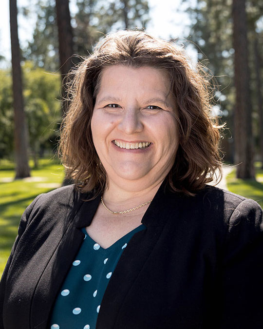 Headshot of Loriann Helgeson