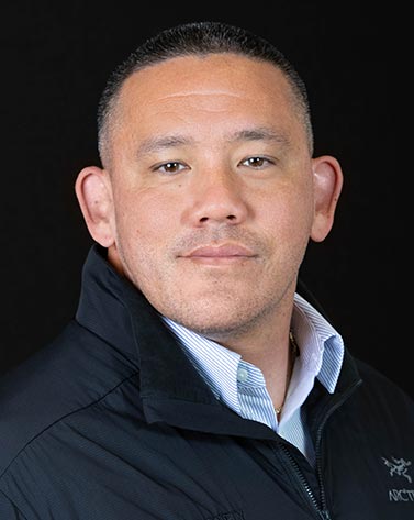 Headshot of Chris Ahsing