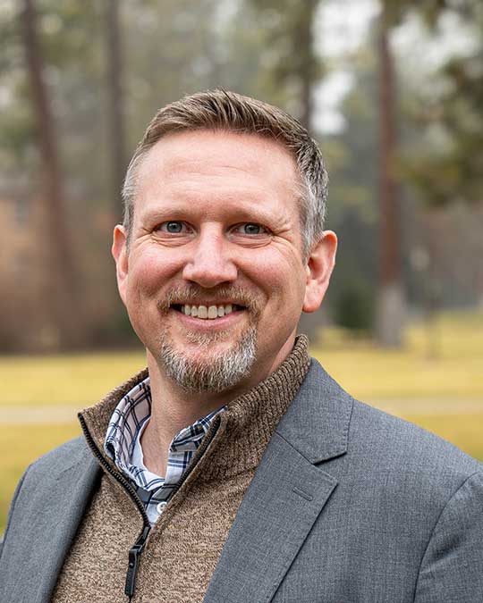 Headshot of Aaron Quigley