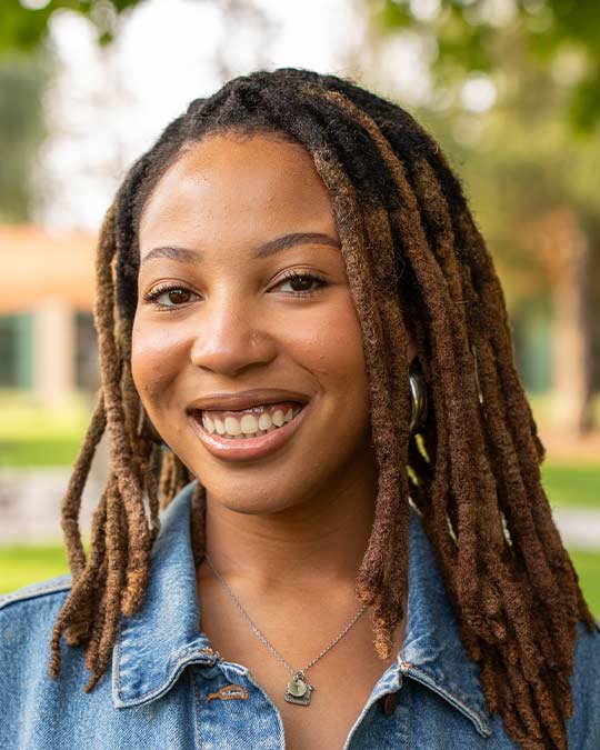 Headshot of Taylor Jenkins Alexander