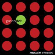 Green Dot logo within red dots on black background.