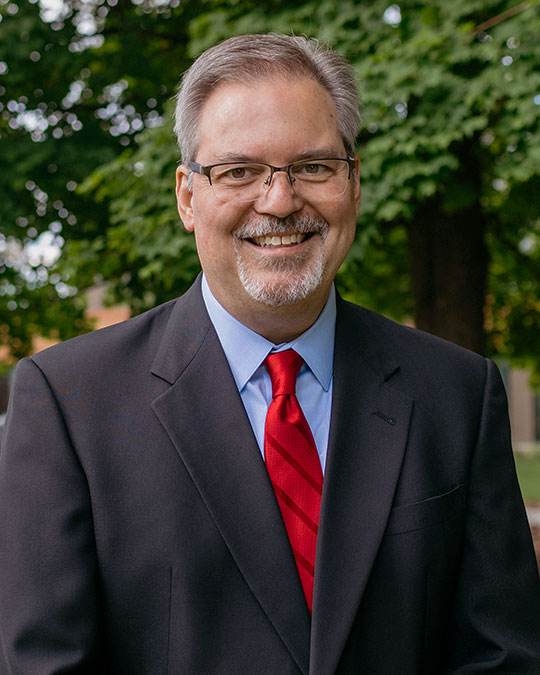 Headshot of Joe Hughes
