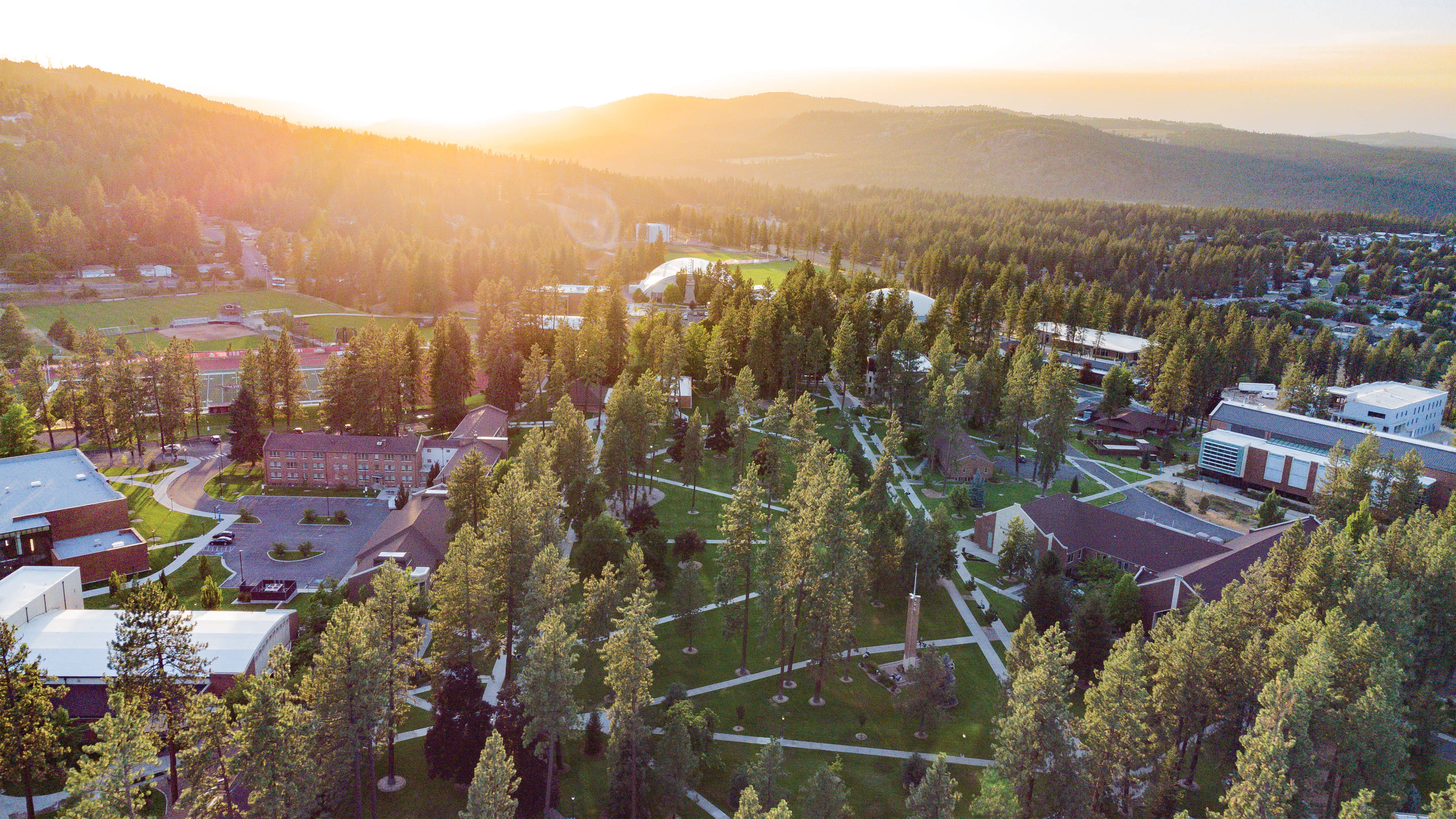 An arial view of the Whitworth campus at sunset.