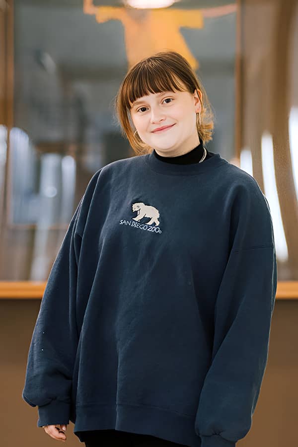 Headshot of Emily Batchelder.