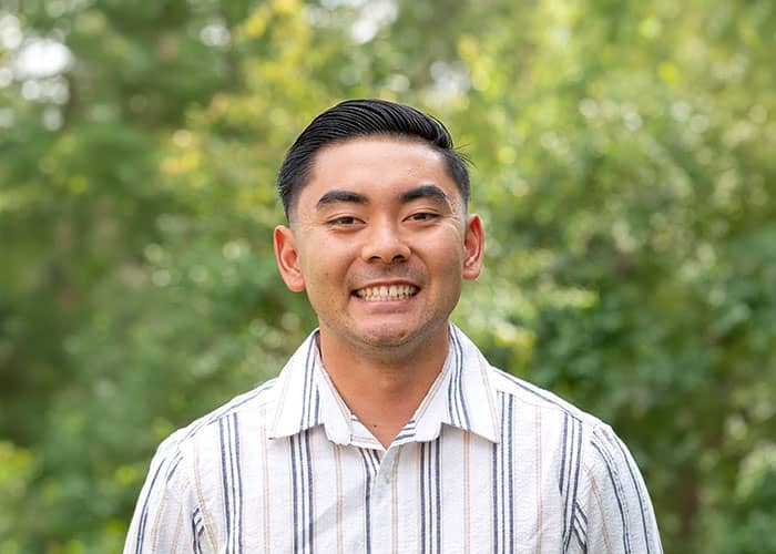 Headshot of Kevin Au.