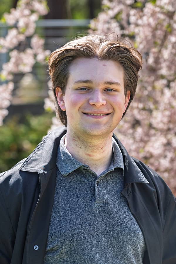 Headshot of Samuel Wisenor.