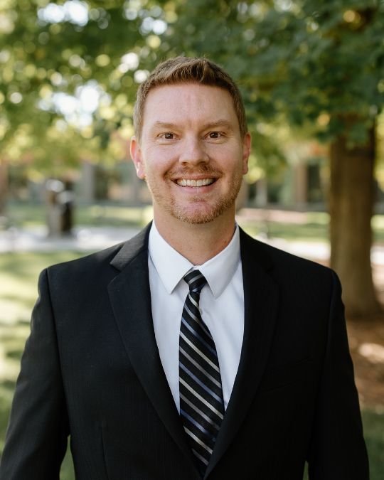 Headshot of Alan Mikkelson