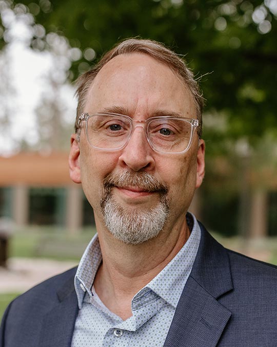 Headshot of Kraig Wheeler