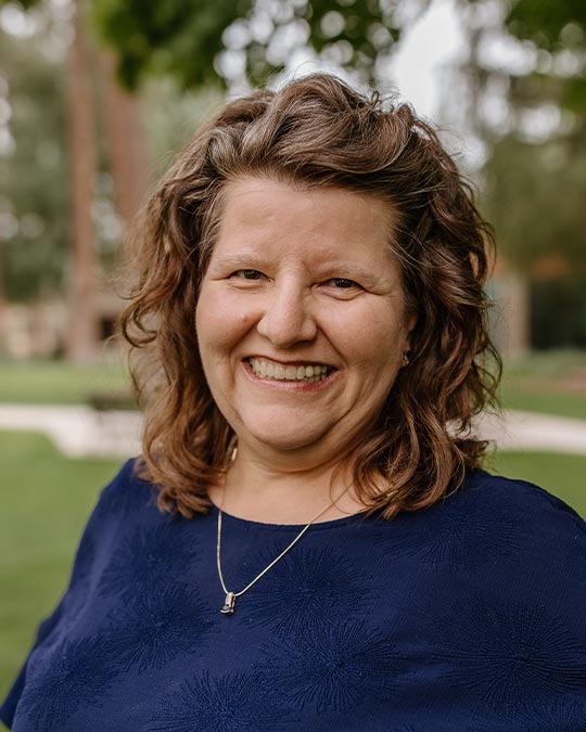 Headshot of Loriann Helgeson