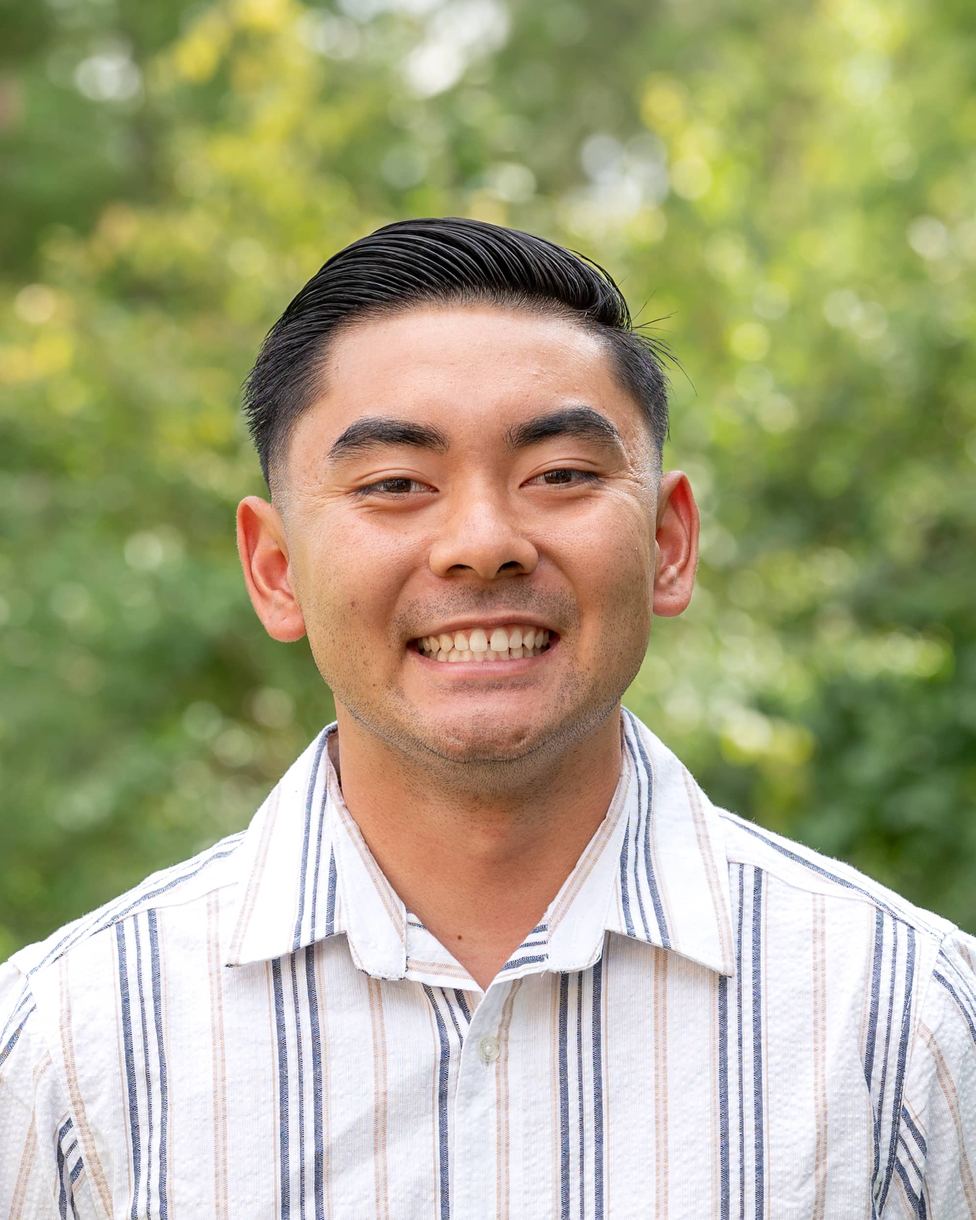 Headshot of Kevin Au.